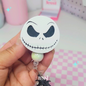 SKELETON FACE BADGE REEL